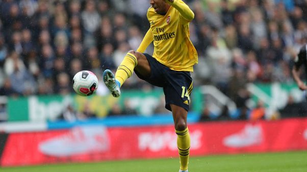 Aubameyang seals Arsenal victory at Newcastle Aubameyang seals Arsenal victory at Newcastle