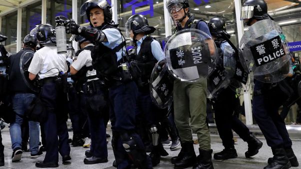 Clashes at Hong Kong airport; U.N. urges restraint over protests Clashes at Hong Kong airport; U.N. urges restraint over protests