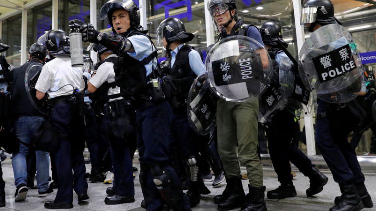 Clashes at Hong Kong airport; U.N. urges restraint over protests