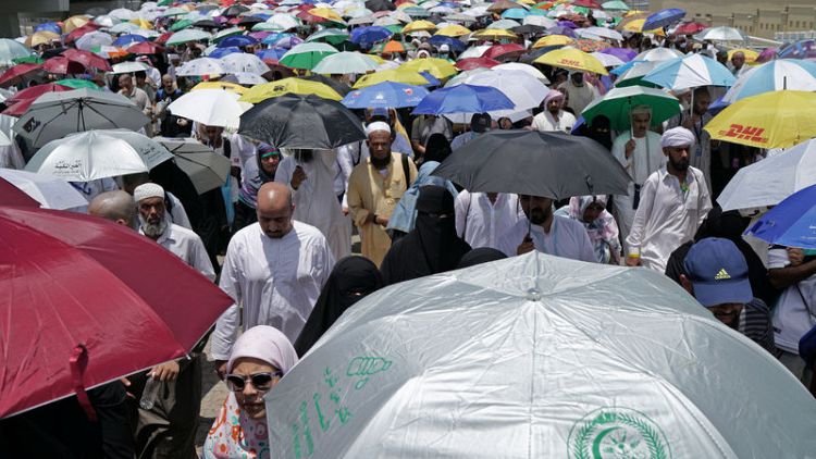 Muslim pilgrims pray in Mecca as haj winds down without incident