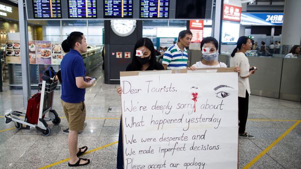 Hong Kong protesters offer apologies, China doubles down after airport clash Hong Kong protesters offer apologies, China doubles down after airport clash