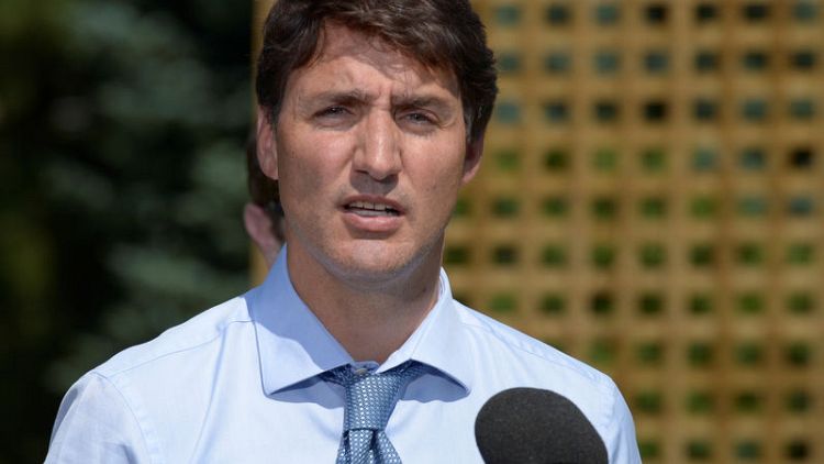 Canada's Trudeau accepts he breached ethics rules, refuses to apologise