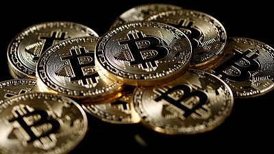 Bitcoin slumps to two-week low on technical trading, market jitters Bitcoin slumps to two-week low on technical trading, market jitters