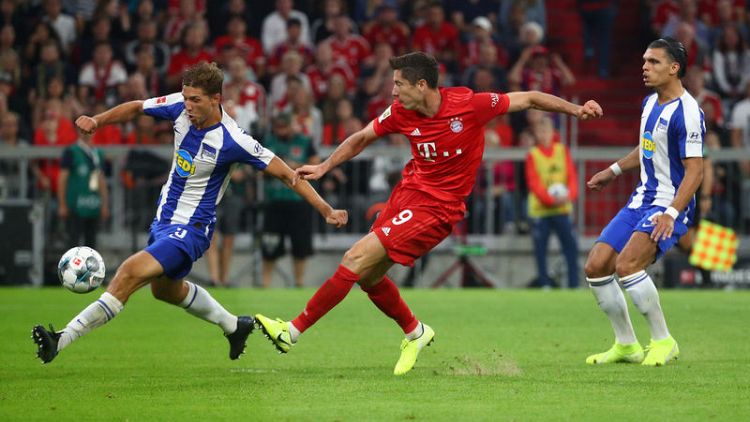 Soccer: Lewandowski double rescues draw for Bayern in season opener