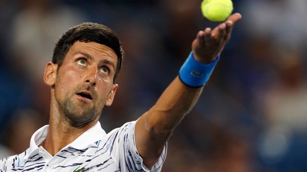 Relentless Djokovic beats Pouille to reach semi-finals Relentless Djokovic beats Pouille to reach semi-finals