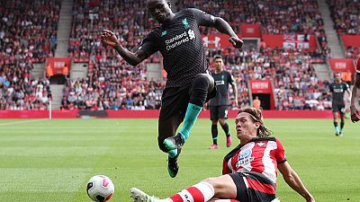 Mane on target in nervy Liverpool win, Arsenal battle past Burnley Mane on target in nervy Liverpool win, Arsenal battle past Burnley