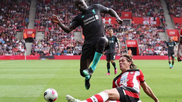 Mane on target in nervy Liverpool win, Arsenal battle past Burnley Mane on target in nervy Liverpool win, Arsenal battle past Burnley