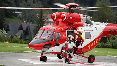 Over two dozen rescuers try to save trapped cavers in Poland Over two dozen rescuers try to save trapped cavers in Poland