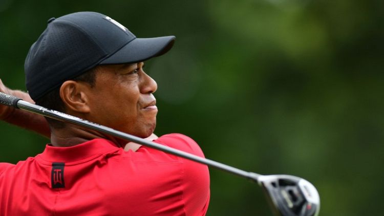 Tiger leaves door open to playing on Presidents Cup team