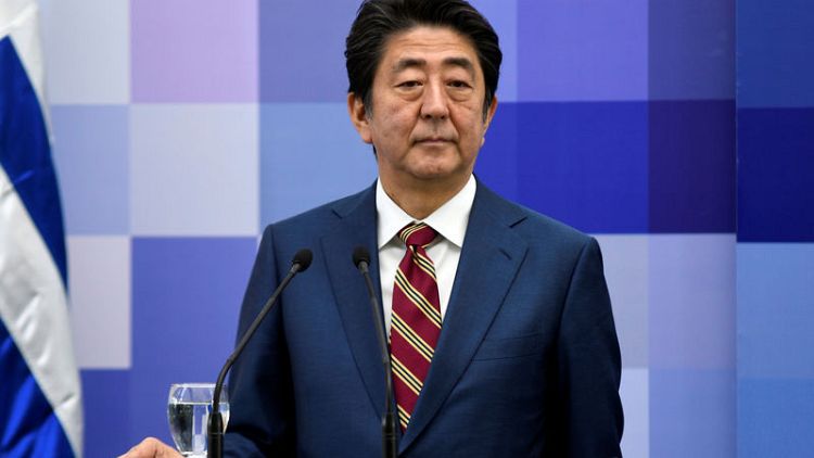 Japan Inc backs Abe's tough trade stance vs South Korea amid row - Reuters poll