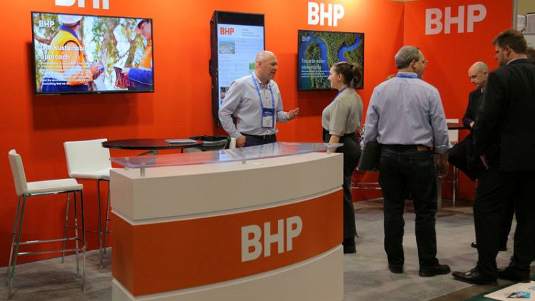 BHP annual profit rises on robust iron ore prices, pays record dividend