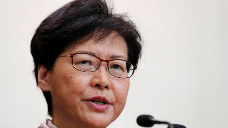 Hong Kong leader says she hopes non-violent protest puts city on road to peace