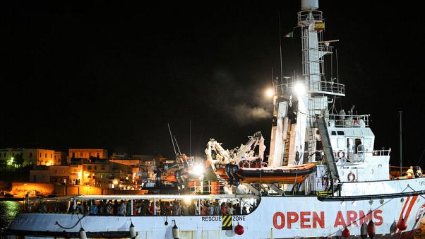 Migrants disembark Open Arms rescue ship on Italian island of Lampedusa Migrants disembark Open Arms rescue ship on Italian island of Lampedusa