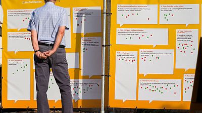 Far-right party surge in eastern German regions threatens Merkel's coalition Far-right party surge in eastern German regions threatens Merkel's coalition