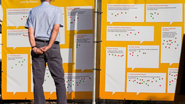 Far-right party surge in eastern German regions threatens Merkel's coalition Far-right party surge in eastern German regions threatens Merkel's coalition
