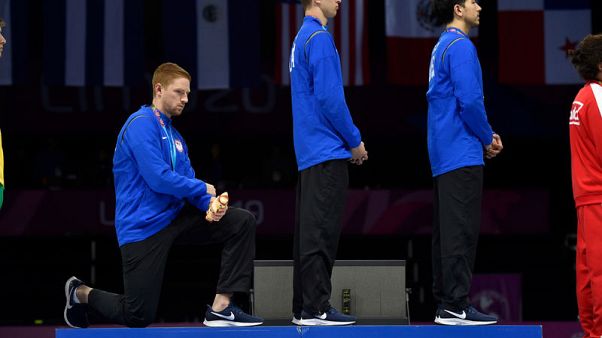 Protesting U.S. athletes receive 12-months probation Protesting U.S. athletes receive 12-months probation