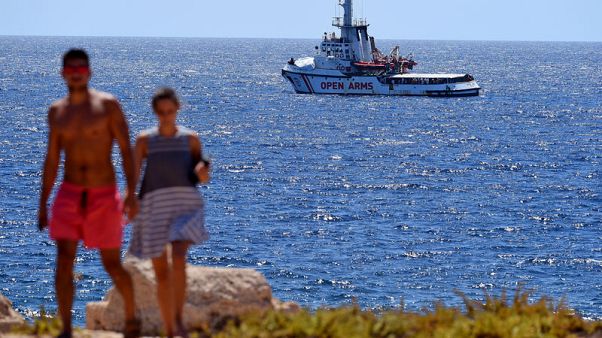 Five EU states to take in Open Arms migrants, ending standoff Five EU states to take in Open Arms migrants, ending standoff