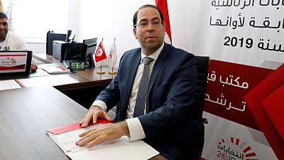 Tunisian PM delegates his powers to focus on presidential race Tunisian PM delegates his powers to focus on presidential race