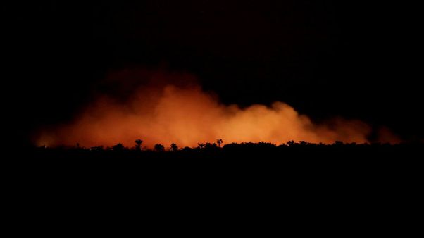 As Amazon burns, Brazil's Bolsonaro tells rest of world not to interfere As Amazon burns, Brazil's Bolsonaro tells rest of world not to interfere