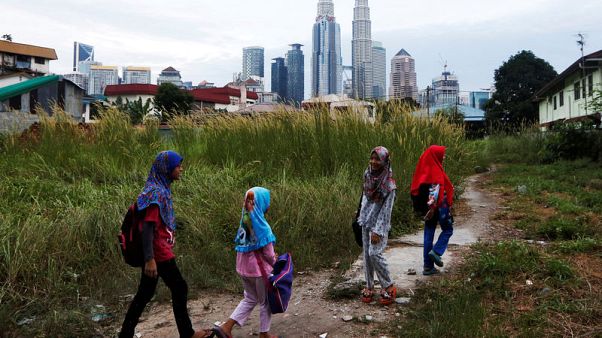 Malaysia's poverty levels far higher than reported, U.N. expert says Malaysia's poverty levels far higher than reported, U.N. expert says