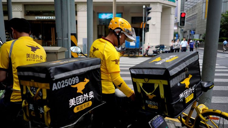 Chinese food delivery firm Meituan posts first quarterly profit since listing