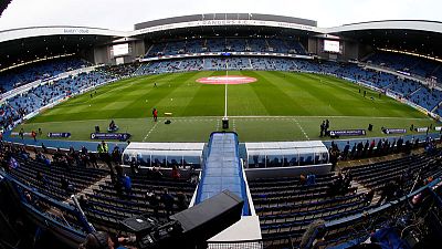 Rangers handed partial stadium ban for fans' racist behaviour Rangers handed partial stadium ban for fans' racist behaviour