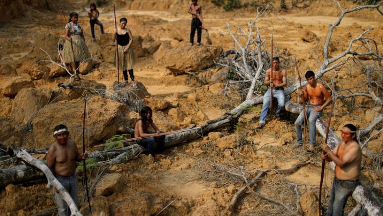 Brazil's indigenous people swear to fight for Amazon 'to last drop of blood'