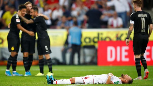 Dortmund stage late comeback to beat Cologne 3-1 Dortmund stage late comeback to beat Cologne 3-1