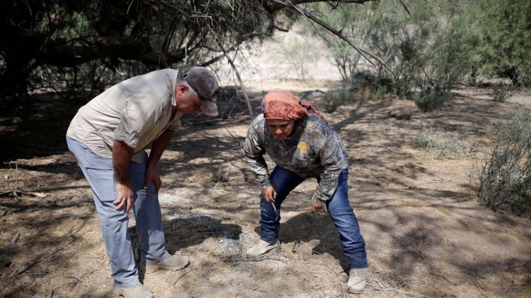 Mexican families scour arid plains for graves of disappeared
