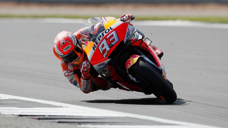 Motorcycling - Marquez storms to pole with lap record at Silverstone