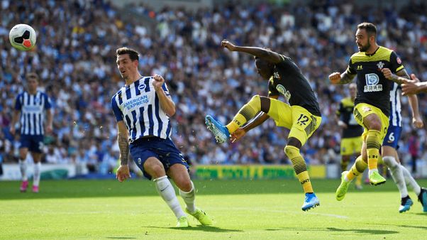 Southampton get off the mark with 2-0 win over 10-man Brighton Southampton get off the mark with 2-0 win over 10-man Brighton