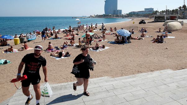 Beach in Barcelona evacuated after explosive device found in water Beach in Barcelona evacuated after explosive device found in water