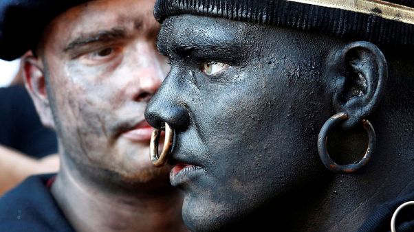 Belgian festival draws criticism over blackface 'Savage' character Belgian festival draws criticism over blackface 'Savage' character