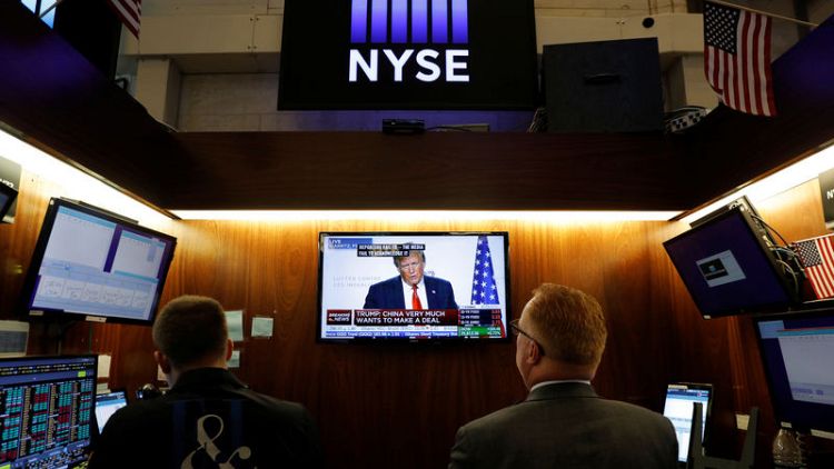 Global stocks, dollar rise as Trump remarks ease China trade tensions