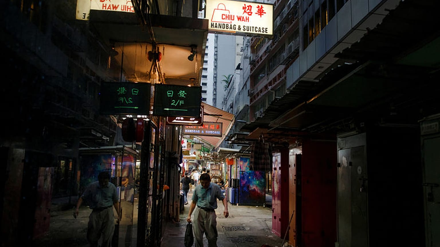 Battered Hong Kong faces economic recession, existential crisis