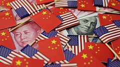 China's yuan slumps to 11-year low, stocks fall as U.S. trade war escalates