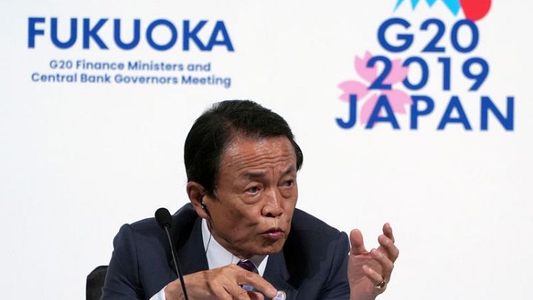 Japan closely watching yen moves 'with urgency' - Finance Minister Aso
