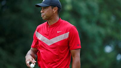 Woods undergoes knee surgery, targets October return Woods undergoes knee surgery, targets October return