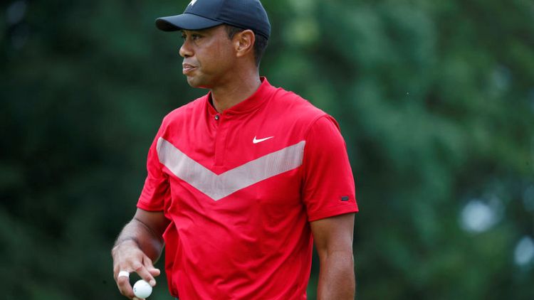 Woods undergoes knee surgery, targets October return