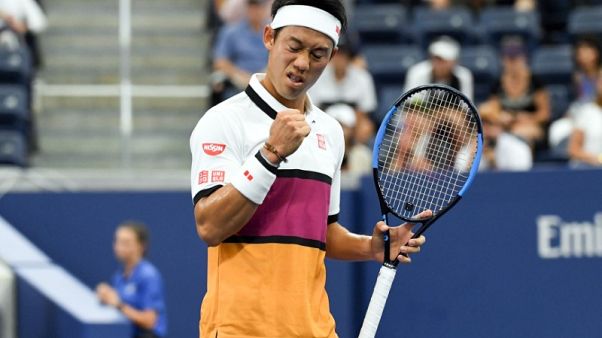 Nishikori fends off spirited Klahn to advance Nishikori fends off spirited Klahn to advance