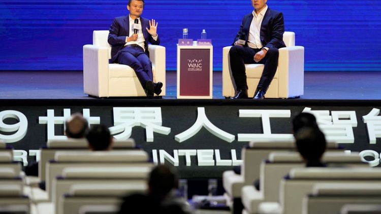 Tesla's Musk, Alibaba's Ma talk aliens and AI, skip issues like trade