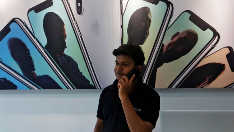 Exclusive: India to woo foreign firms like Apple to capitalise on U.S.-China trade war