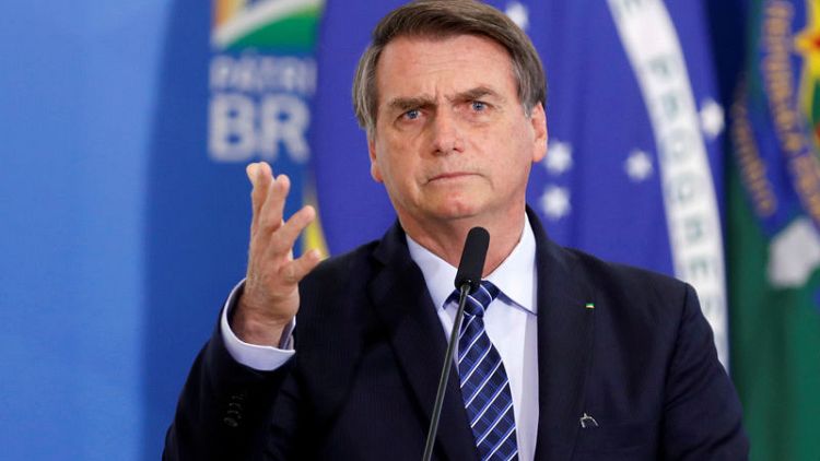 Amazon fires scorch Bolsonaro's reputation abroad, but not in Brazil