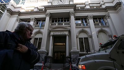 S&P slashes Argentina's long-term debt three notches on maturity extension plan S&P slashes Argentina's long-term debt three notches on maturity extension plan