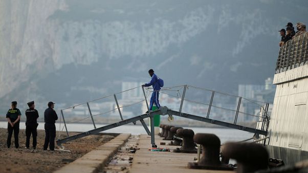 Spanish warship with migrants arrives in Spain after Italy row Spanish warship with migrants arrives in Spain after Italy row