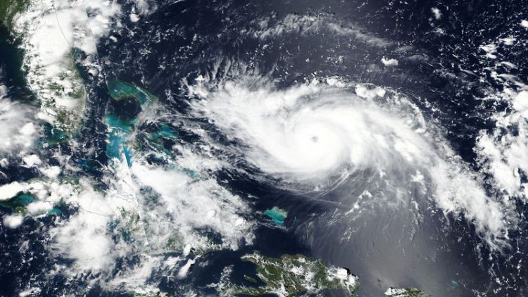 Hurricane Dorian swirls towards anxious Florida, packing 140-mph winds