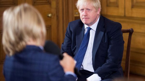 Johnson says he will continue to bring down public debt Johnson says he will continue to bring down public debt