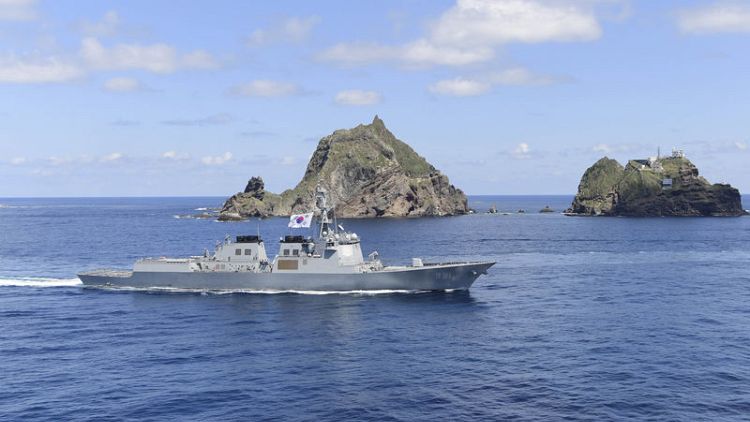 South Korean lawmakers visit disputed islets as Japan tensions mount