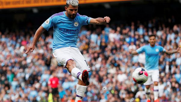 Aguero scores double as Man City hit four in win over Brighton Aguero scores double as Man City hit four in win over Brighton