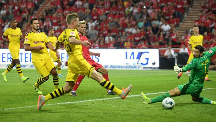 Union shock Dortmund 3-1 for maiden Bundesliga win